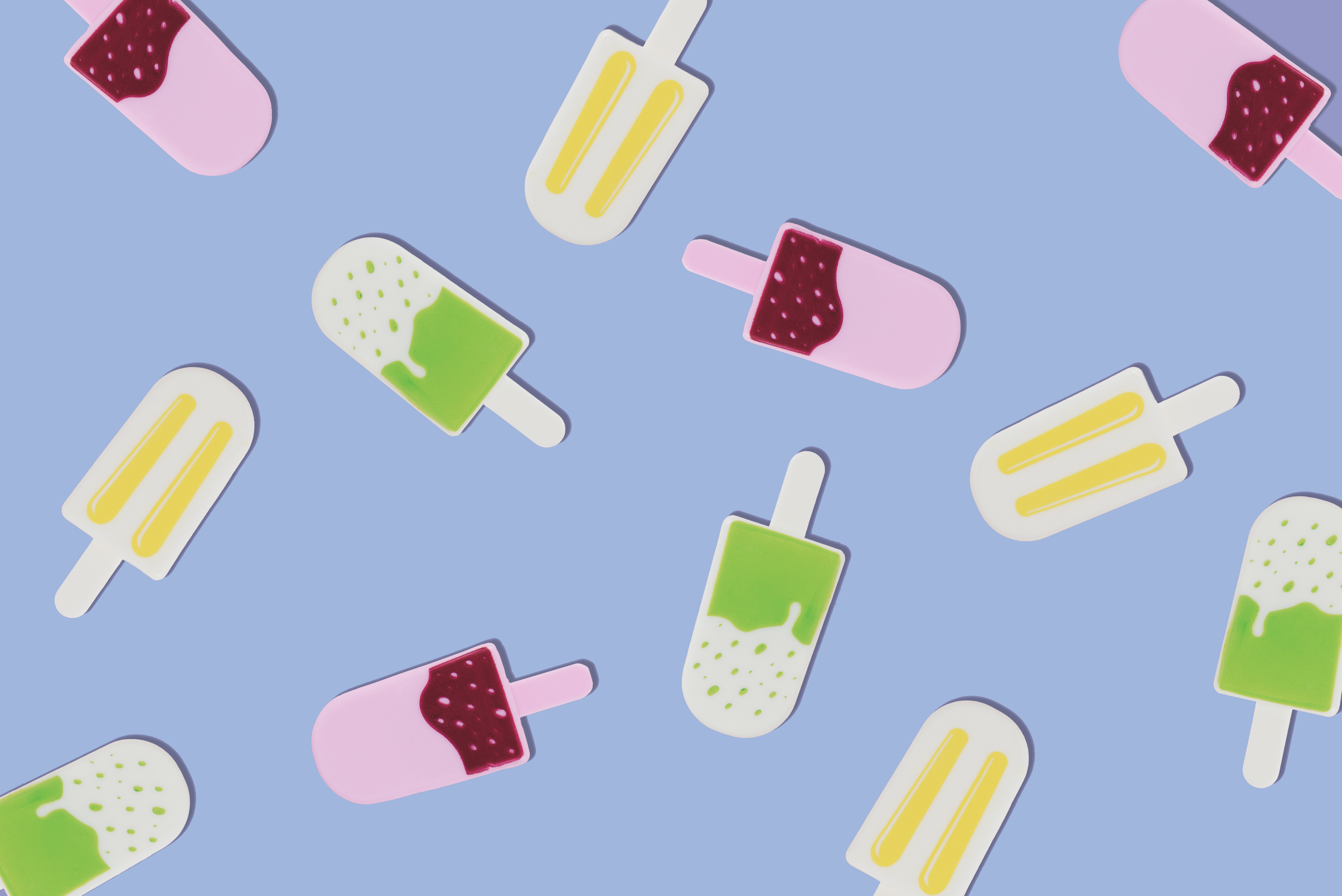 Colorful Popsicles Flat lay on Blue Background 